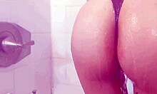 Young 18-year-old stepsister with flawless buttocks showers
