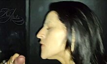 A man pleasures a stranger through a gloryhole, receives oral sex and facial